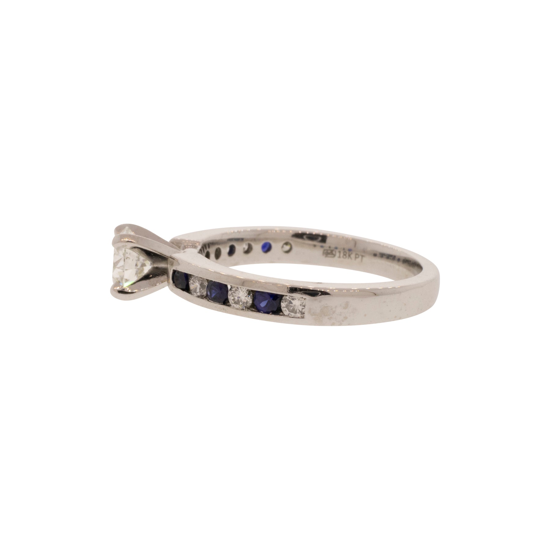 Triple X Round Brilliant Diamond and Sapphire Accented Solitaire Ring