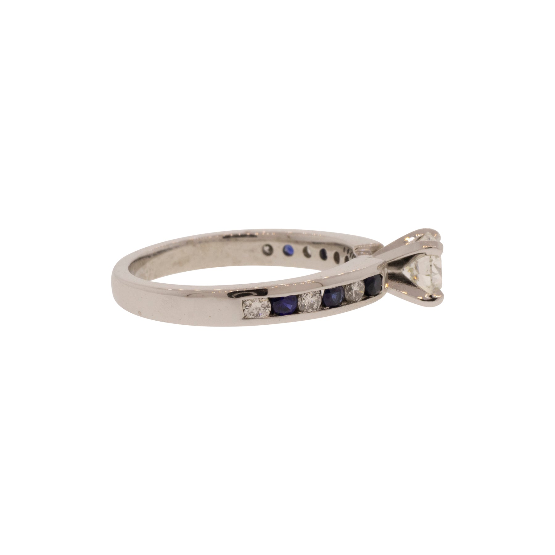 Triple X Round Brilliant Diamond and Sapphire Accented Solitaire Ring