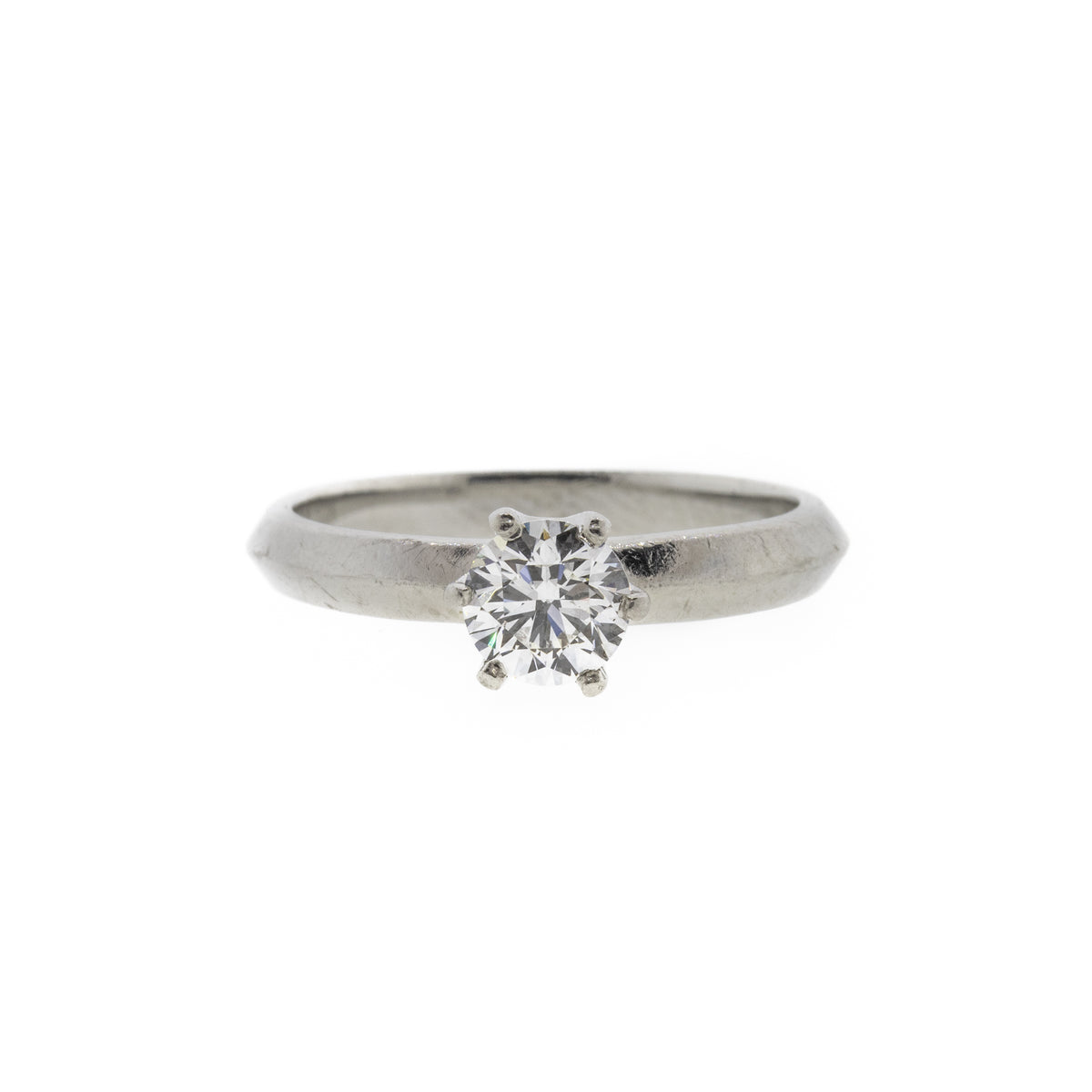 Round Brilliant Diamond and Knife Edge Platinum Ring