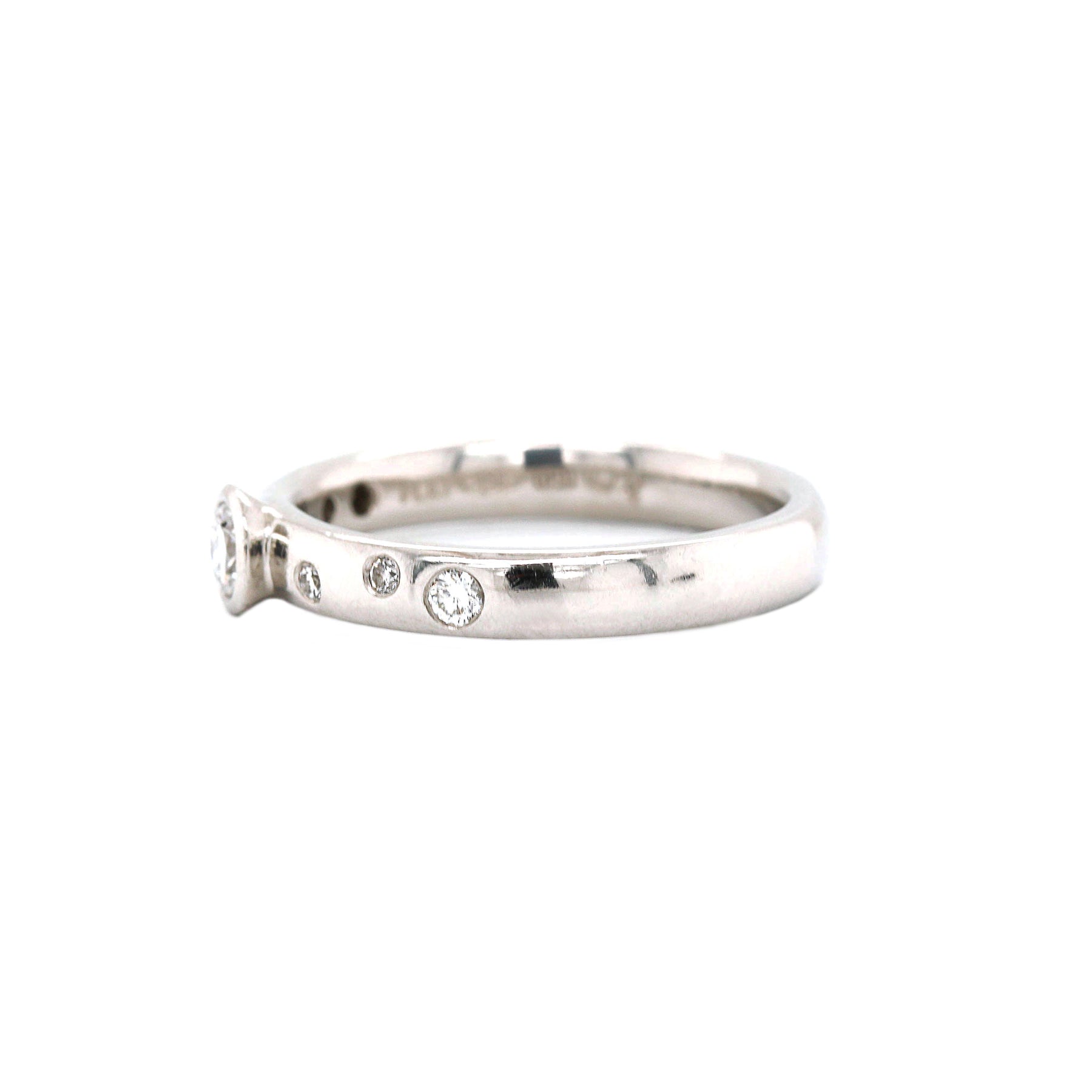 Platinum Bezel Set Inset Scattered Diamond Band